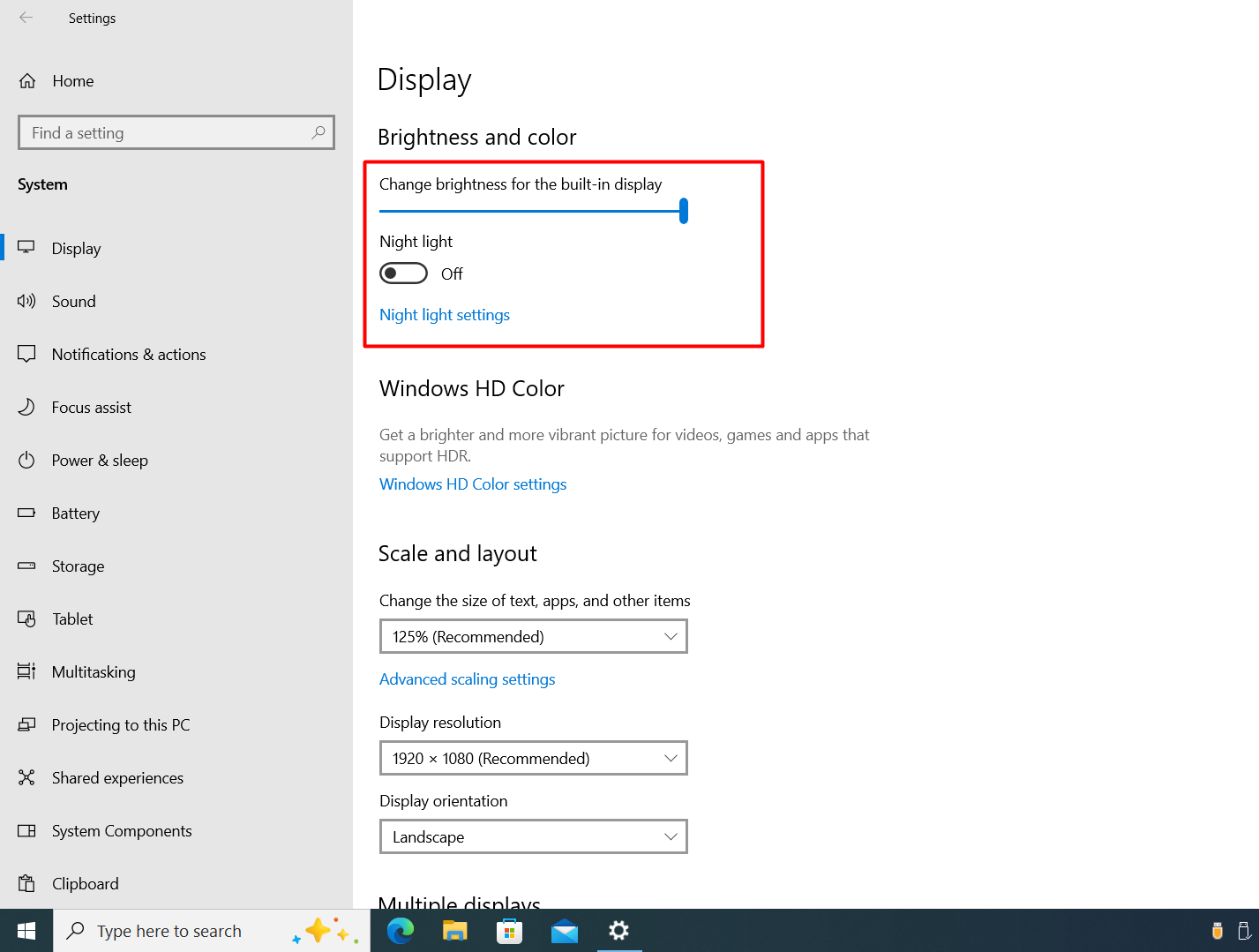 Windows 10 Settings, System, Display: Brightness and color section with brightness slider and Night light